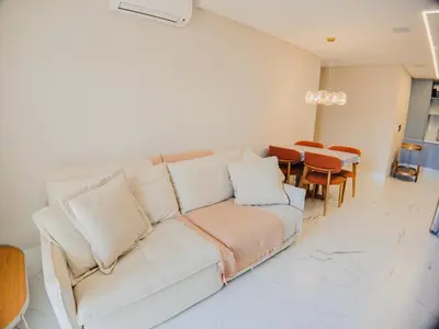 Uma área de estar em Apartamento de luxo a 20 metros do mar de Mariscal