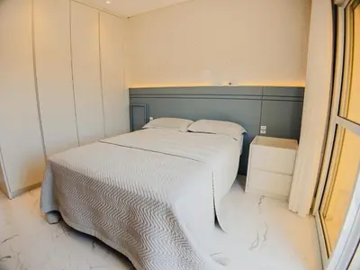 Uma cama ou camas num quarto em Apartamento de luxo a 20 metros do mar de Mariscal