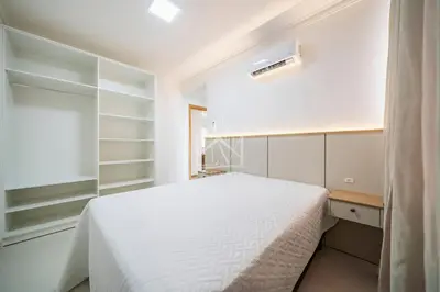 Uma cama ou camas num quarto em Cobertura 07 Antares Bombinhas