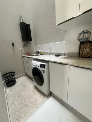 A cozinha ou kitchenette de Alugo casa perfeita há 4km da Praia Central de Balneário Camboriú