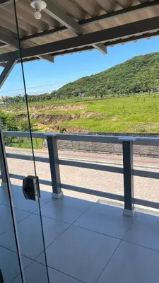 Uma varanda ou terraço em Casa de temporada em Bombinhas - SC