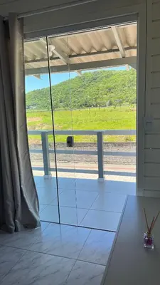 Uma varanda ou terraço em Casa de temporada em Bombinhas - SC