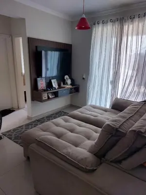 Uma cama ou camas num quarto em Apartamento para Férias