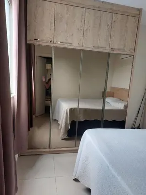 Uma cama ou camas num quarto em Apartamento para Férias