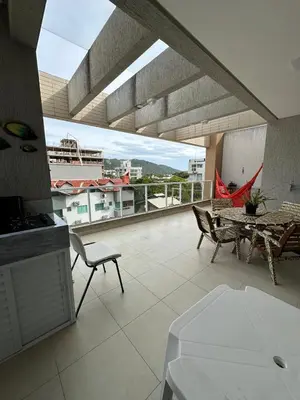 A piscina em ou perto de Cobertura Duplex em Canto Grande