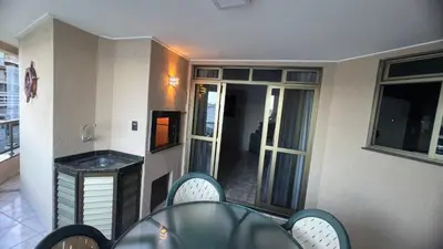 Uma área de estar em Meia Praia Pé na Areia - Vista Mar