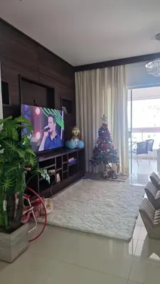 Uma televisão e/ou sistema de entretenimento em Apartamento 2 quadras do mar