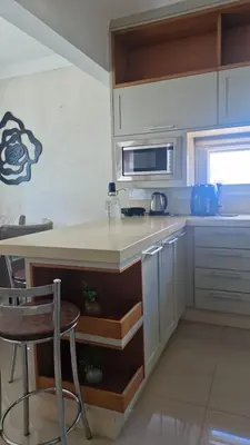 A cozinha ou kitchenette de Apartamento 2 quadras do mar