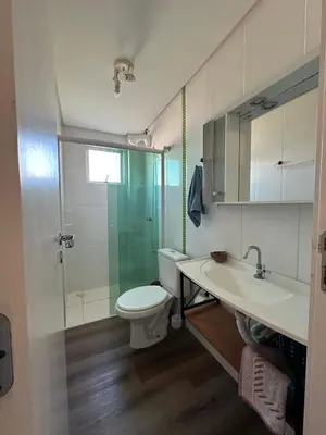 Uma casa de banho em Apartamento em Bombas
