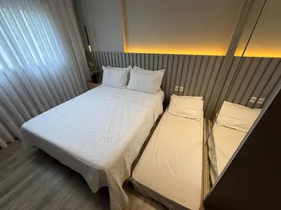 Uma cama ou camas num quarto em JD Village