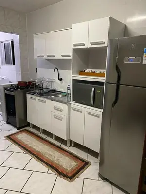 A cozinha ou kitchenette de Apartamento próximo ao mar