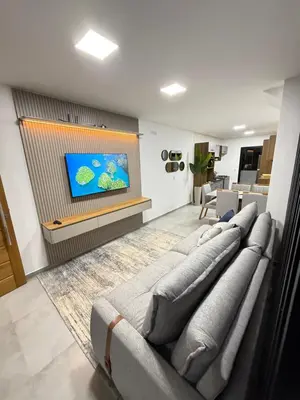 Uma televisão e/ou sistema de entretenimento em MShome, Casa de Praia Completa em Bombinhas
