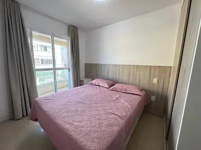 Uma cama ou camas num quarto em Confortável Apto a 70 Metros da Praia de Bombinhas