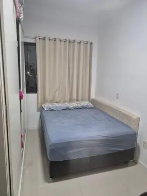 Uma cama ou camas num quarto em Apartamento final do ano