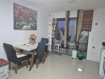 Uma área de estar em Apartamento final do ano