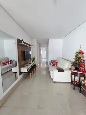Uma cama ou camas num quarto em Apartamento no centro de Itapema