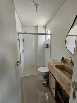 Uma casa de banho em Apartamento no centro de Itapema