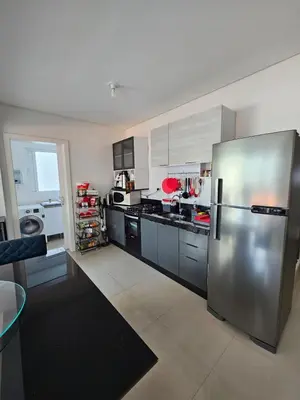 A cozinha ou kitchenette de Apartamento no centro de Itapema