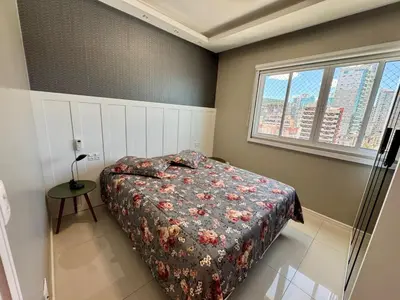 Uma cama ou camas num quarto em Apto Vista Mar 3 Suítes Meia Praia