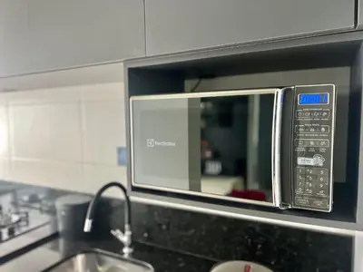 A cozinha ou kitchenette de Perfeito! Apto na Praia de Palmas - DY01J