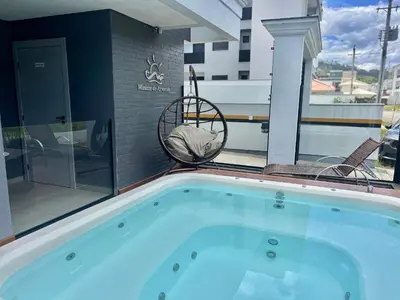 A piscina em ou perto de Perfeito! Apto na Praia de Palmas - DY01J