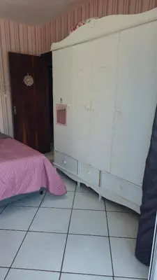 Uma cama ou camas num quarto em Apartamento Completo na Praia de Bombas - 3 quartos - 10 pessoas