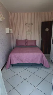 Uma cama ou camas num quarto em Apartamento Completo na Praia de Bombas - 3 quartos - 10 pessoas