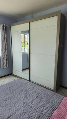 Uma cama ou camas num quarto em Apartamento Completo na Praia de Bombas - 3 quartos - 10 pessoas