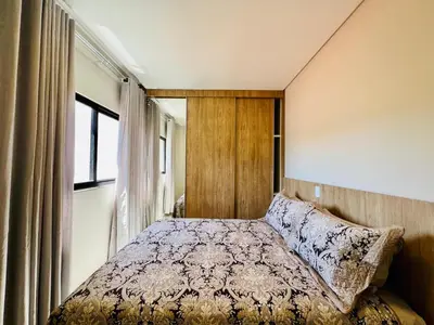 Uma cama ou camas num quarto em Kawa Residence - Mariscal