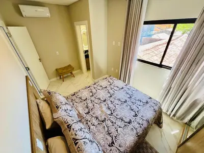 Uma cama ou camas num quarto em Kawa Residence - Mariscal