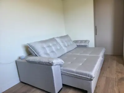 Uma área de estar em Apartamento Vista Mar, com Piscina Aquecida e Jacuzzi