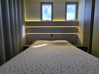Uma cama ou camas num quarto em Apartamento Vista Mar, com Piscina Aquecida e Jacuzzi