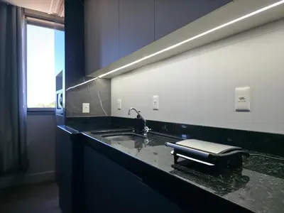 A cozinha ou kitchenette de Apartamento Vista Mar, com Piscina Aquecida e Jacuzzi