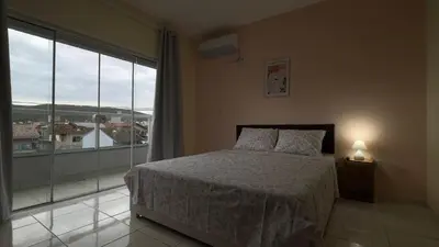 Uma cama ou camas num quarto em Residencial São Francisco