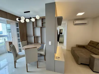 Uma área de estar em Apto novo em Itapema - Prédio com piscina - 2 quartos sendo 1 suíte