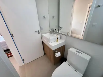 Uma casa de banho em Apartamento em Governador Celso Ramos SC - Palmas