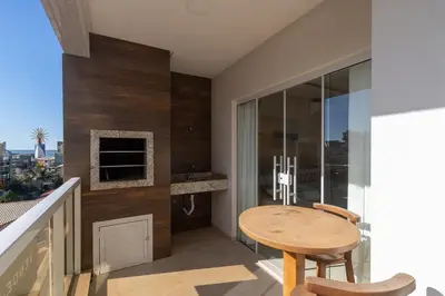 Uma varanda ou terraço em Mario Guilherme 305 - 2 Suítes - Praia do Centro