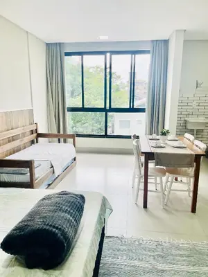 Uma cama ou camas num quarto em Residencial Vila das Canoas