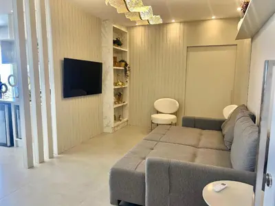 Uma televisão e/ou sistema de entretenimento em Perfeita! Cobertura na Praia de Palmas! - EF02J