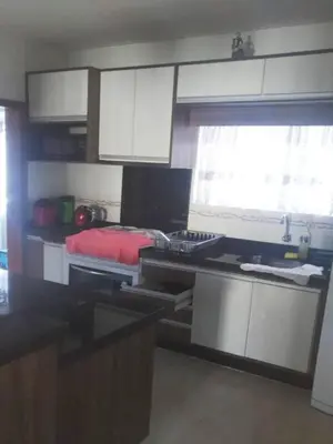 A cozinha ou kitchenette de 2 dormitorios com Ar cond no centro