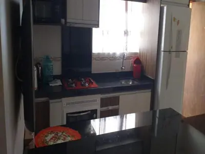 A cozinha ou kitchenette de 2 dormitorios com Ar cond no centro