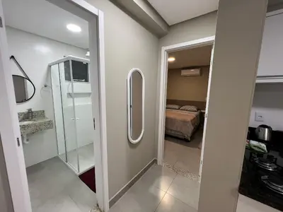 Uma cama ou camas num quarto em Residencial Tia Dilma