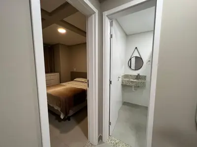 Uma cama ou camas num quarto em Residencial Tia Dilma