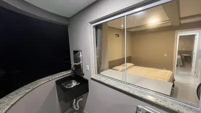 Uma cama ou camas num quarto em Residencial Tia Dilma