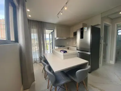 A cozinha ou kitchenette de Apartmento em Pereque - Porto Belo