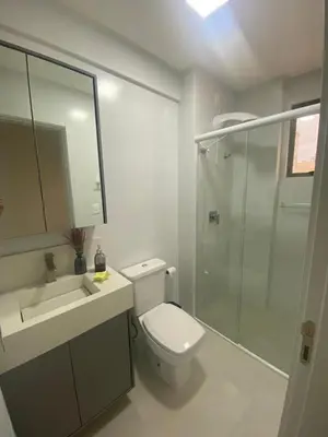Uma casa de banho em Meia Praia, Itapema SC 3 Suites, 2 vagas de garagem