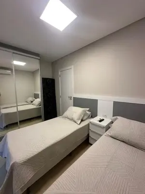Uma cama ou camas num quarto em Edifício Porto Fino 303 - 3 Quartos - Churrasqueira - 2 Vagas de Garagem
