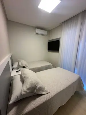Uma cama ou camas num quarto em Edifício Porto Fino 303 - 3 Quartos - Churrasqueira - 2 Vagas de Garagem