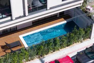 A piscina em ou perto de Apto 3 Dormitórios com Sacada e Churrasqueira