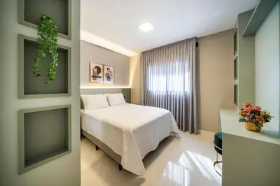 Uma cama ou camas num quarto em Apartamento alto padrão 3 quartos c/piscina